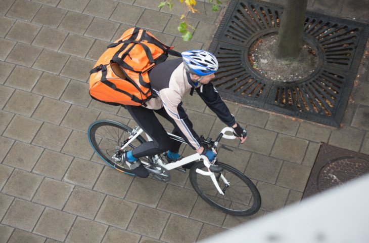 Delivery Boy running a bicycle